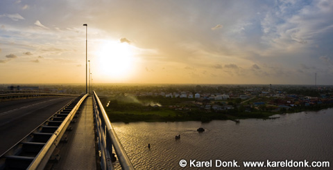 Panorama of the J.A. Wijdenbosch Bridge at sunset (click for larger image)